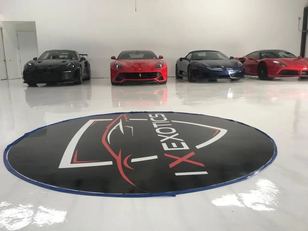 IX Exotics — Exotic car storage · White epoxy & logo