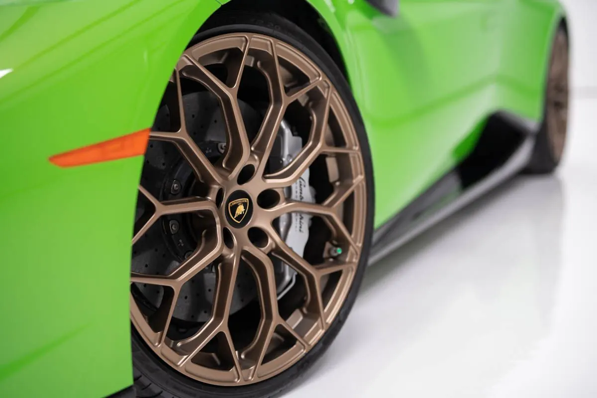 White epoxy floor with a sports car