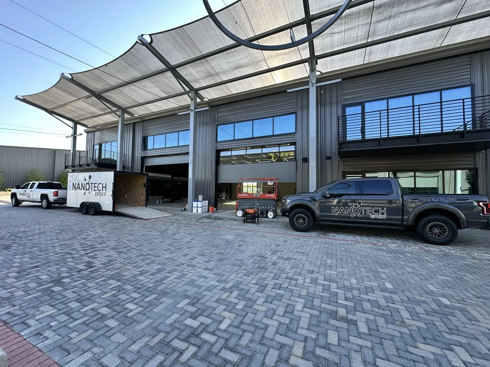 NanoTech Epoxy crew diamond grinding concrete before an epoxy installation, view 5