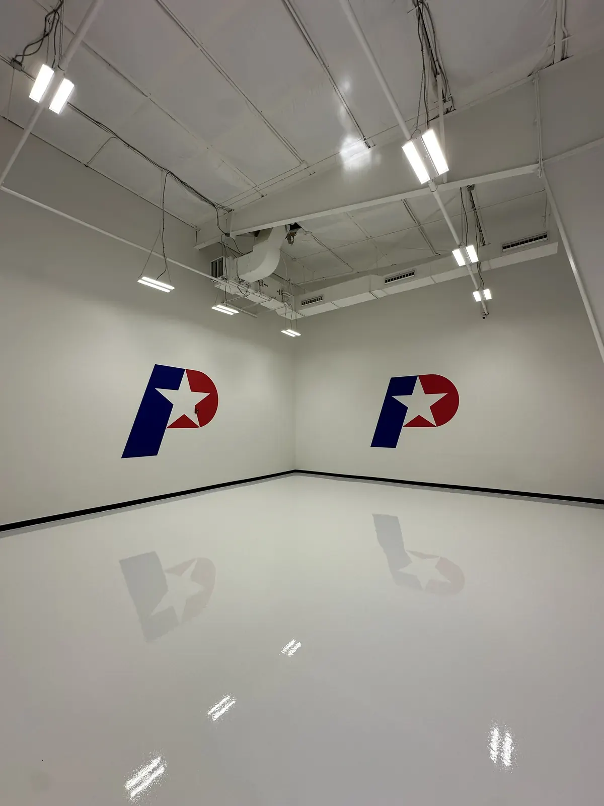Payne Motors — Dealership · White epoxy, view 2
